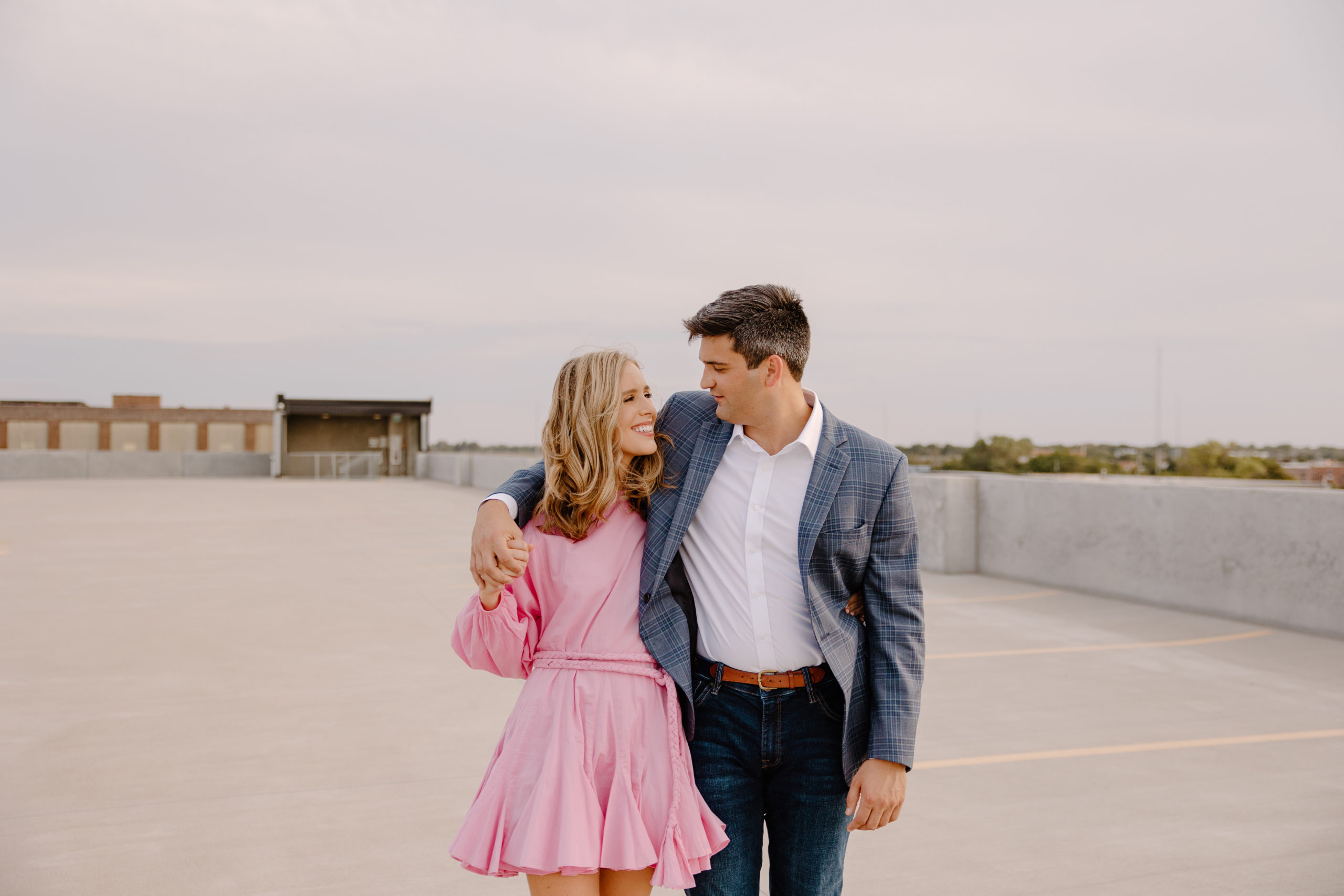 Couple on a rooftop during Downtown Wichita Engagement Session
